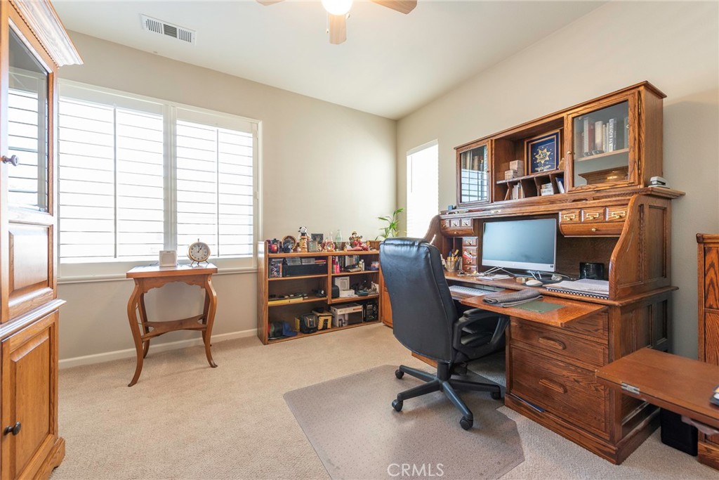 33837 Cansler Way Yucaipa, CA 92399 - Photo 26 of 49 a view of a workspace with furniture and a window