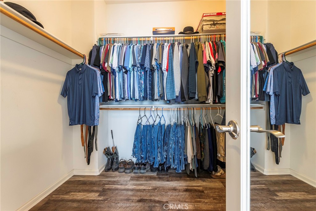 33837 Cansler Way Yucaipa, CA 92399 - Photo 35 of 49 a view of walk in closet with clothes
