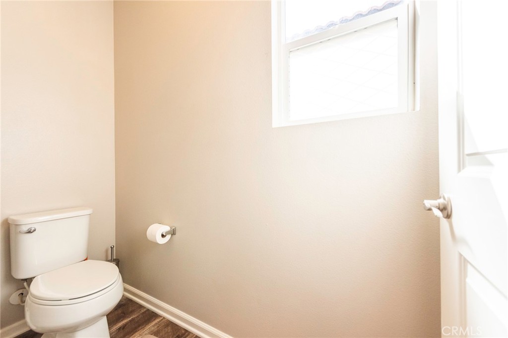 33837 Cansler Way Yucaipa, CA 92399 - Photo 36 of 49 a white toilet sitting next to a shower