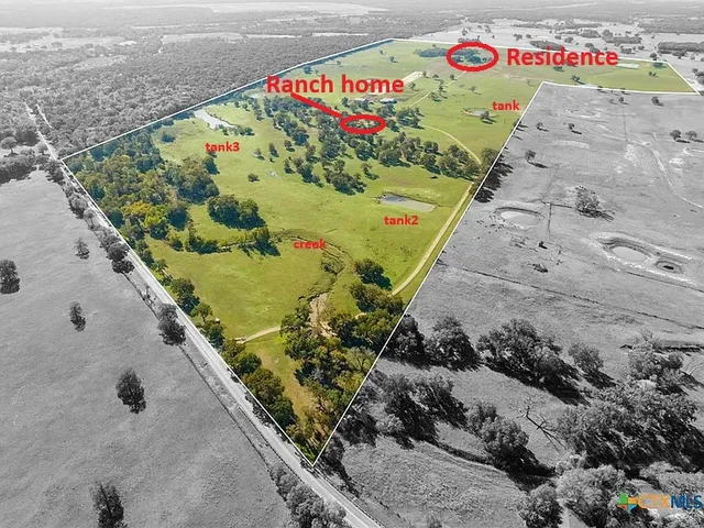 a view of a sign on the side of the road