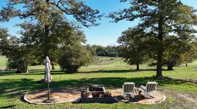 a lake view with a garden