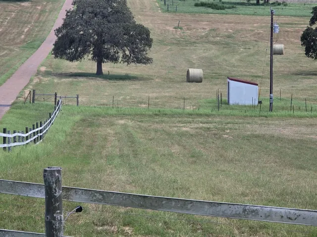 a view of a wooden floor and a lake view