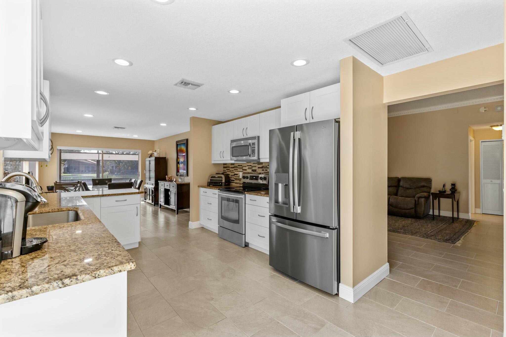 19931 Oslo Court Boca Raton, FL 33434 - Photo 3 of 40 Kitchen View Included Living Room Access