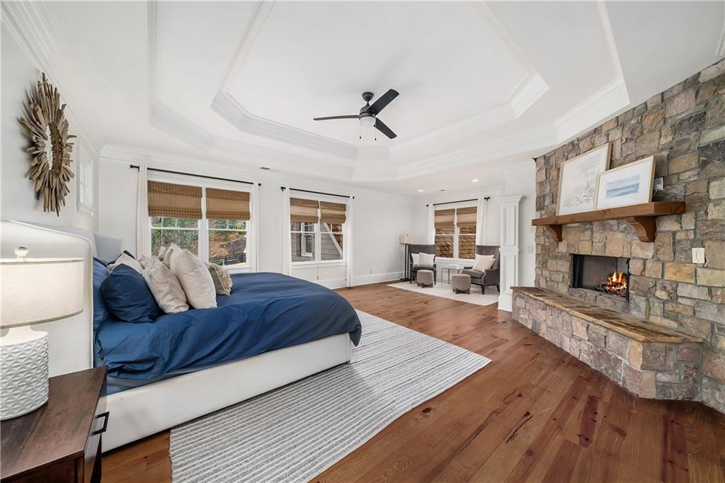 13200 Owens Way Milton, GA 30004 - Photo 45 of 113 a living room with furniture fireplace and window