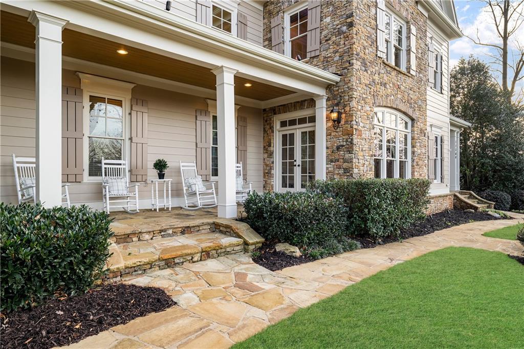 13200 Owens Way Milton, GA 30004 - Photo 6 of 113 a view of a house with yard and plants