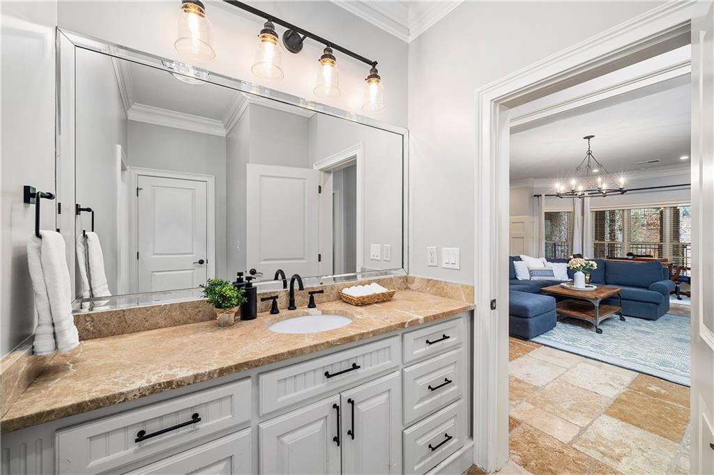 13200 Owens Way Milton, GA 30004 - Photo 65 of 113 a spacious en suite bathroom with double sink and a mirror