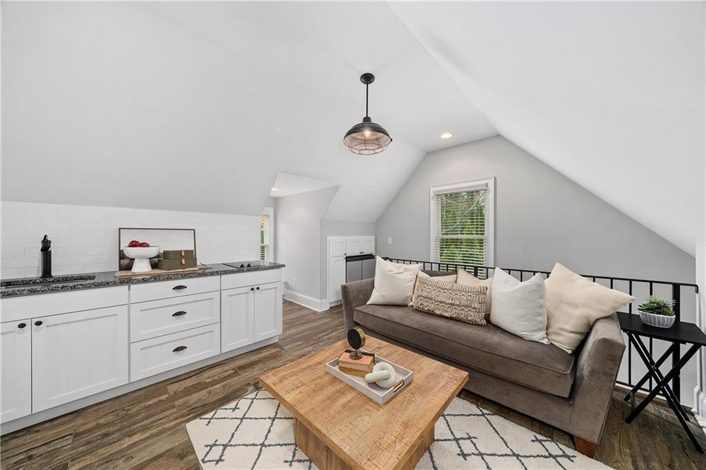13200 Owens Way Milton, GA 30004 - Photo 79 of 113 a living room with furniture and view of kitchen