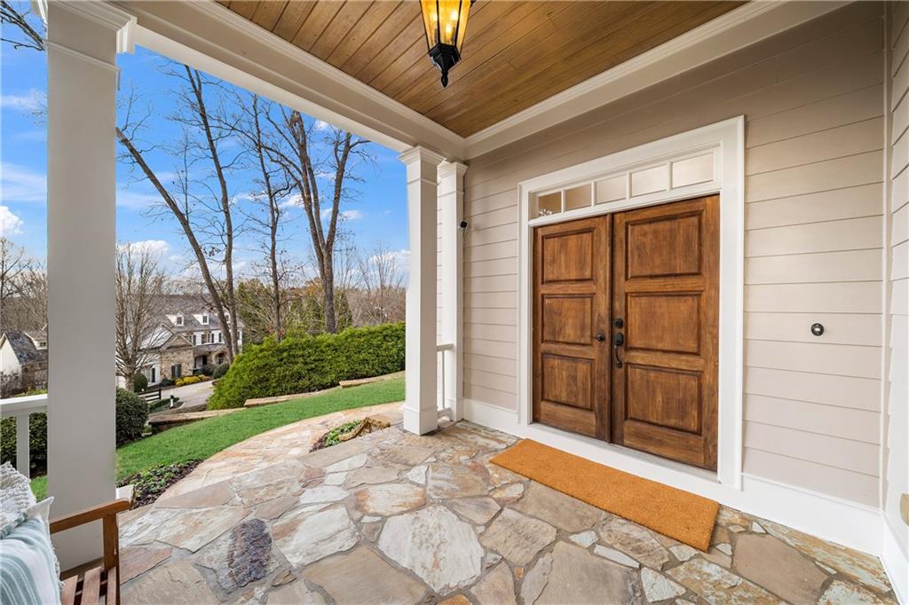 13200 Owens Way Milton, GA 30004 - Photo 8 of 113 a view of a porch with wooden floor and outer view