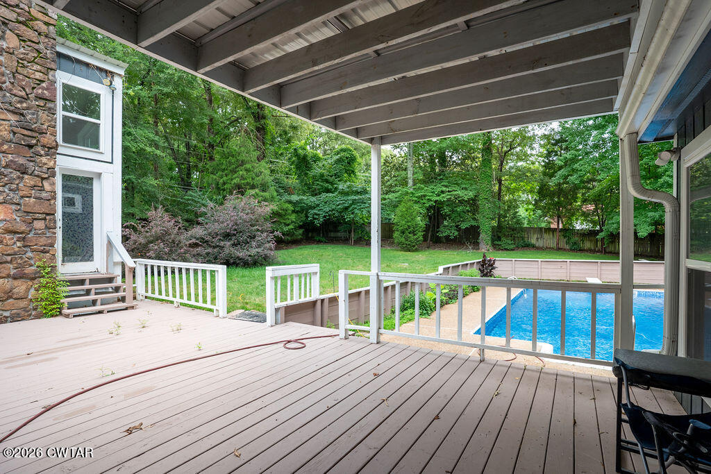 7 Timberlake Drive Jackson, TN 38305 - Photo 32 of 38 a house view with a seating space and garden view
