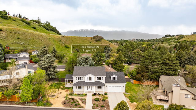 1552 Sumac Drive Logan, UT 84321 - Photo 70 of 72 Contemporary residence with a prominent gabled roofline and light-toned siding