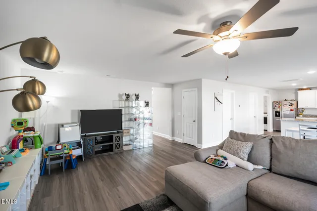 a bathroom with a sink toilet and a mirror