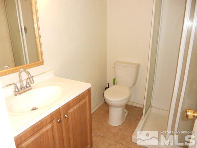 20 Volmer Way Reno, NV 89512 - Photo 17 of 24 a bathroom with a sink and a toilet