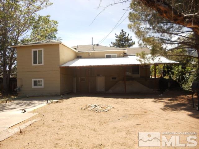 20 Volmer Way Reno, NV 89512 - Photo 2 of 24 a view of a house covered in snow