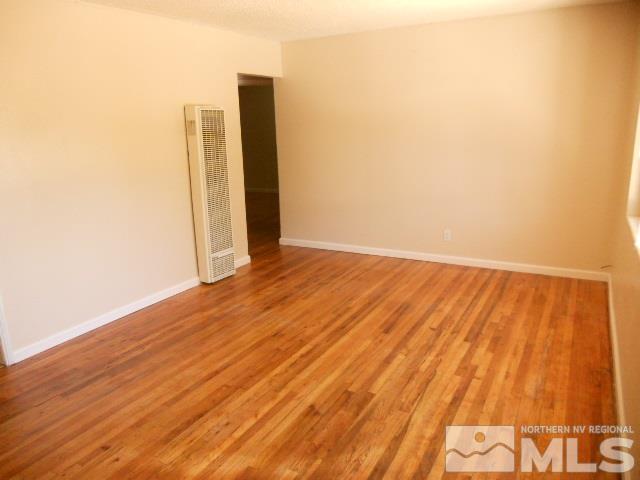 20 Volmer Way Reno, NV 89512 - Photo 5 of 24 a view of a room with wooden floor