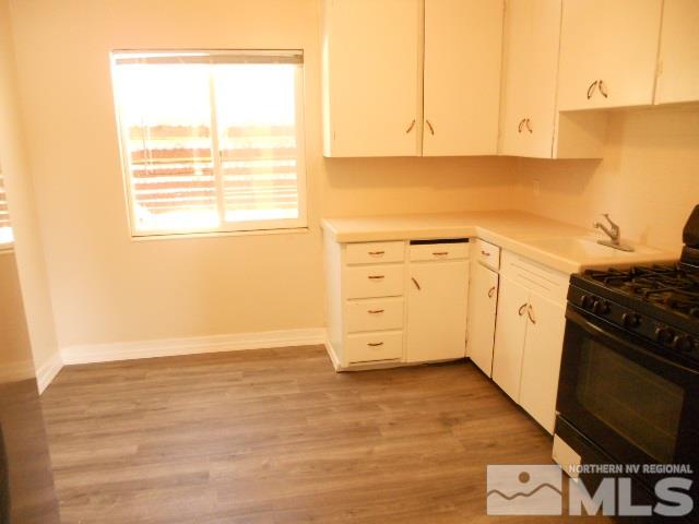 20 Volmer Way Reno, NV 89512 - Photo 8 of 24 a view of a kitchen with wooden floor