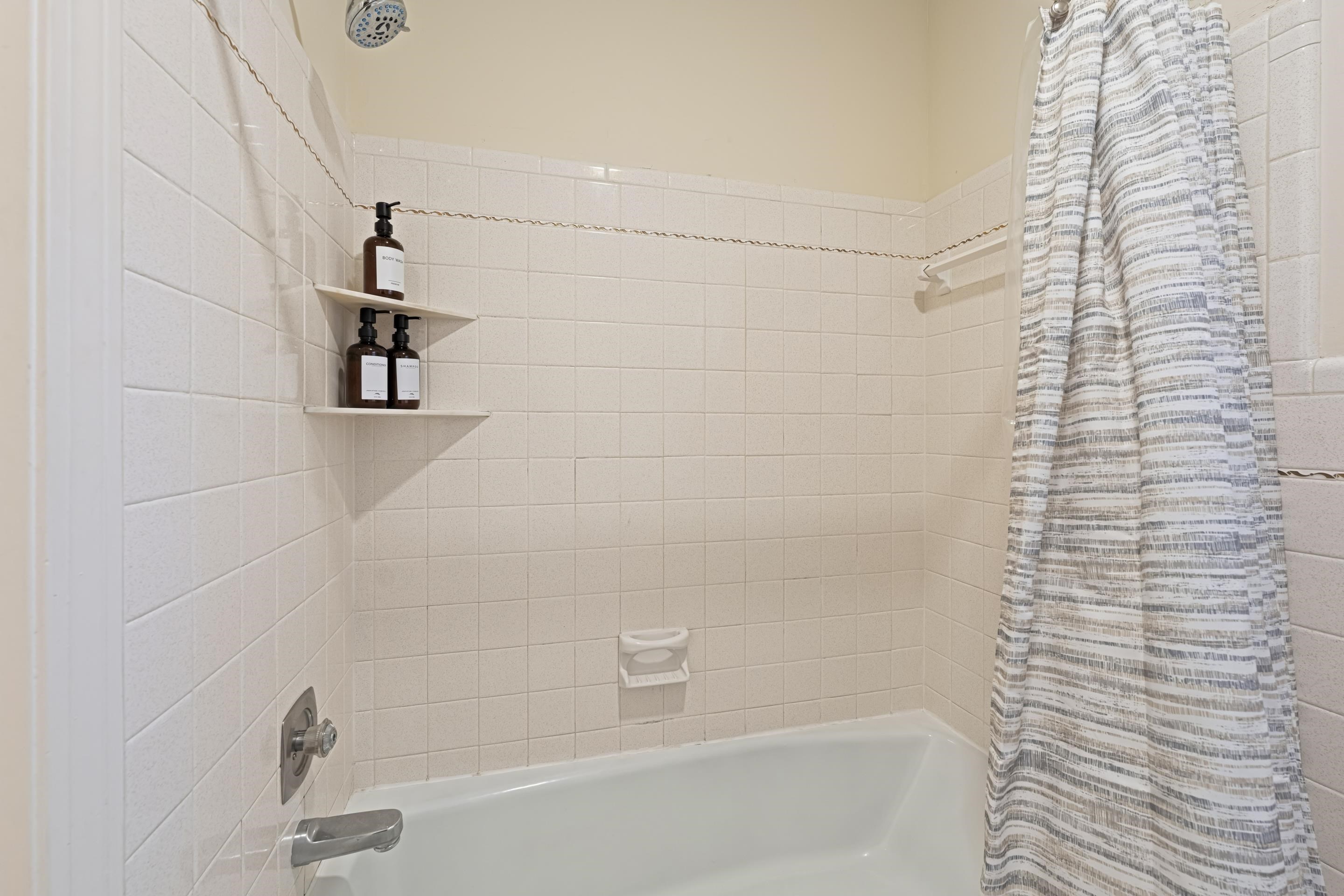 1316 Kirby Road Memphis, TN 38120 - Photo 21 of 30 a bathroom with a shower