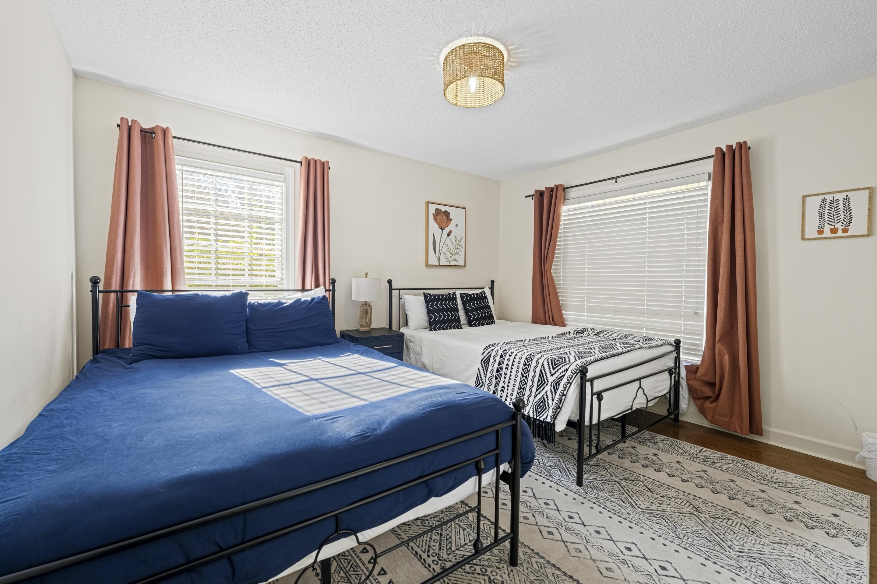 1316 Kirby Road Memphis, TN 38120 - Photo 23 of 30 a bedroom with a bed and a window