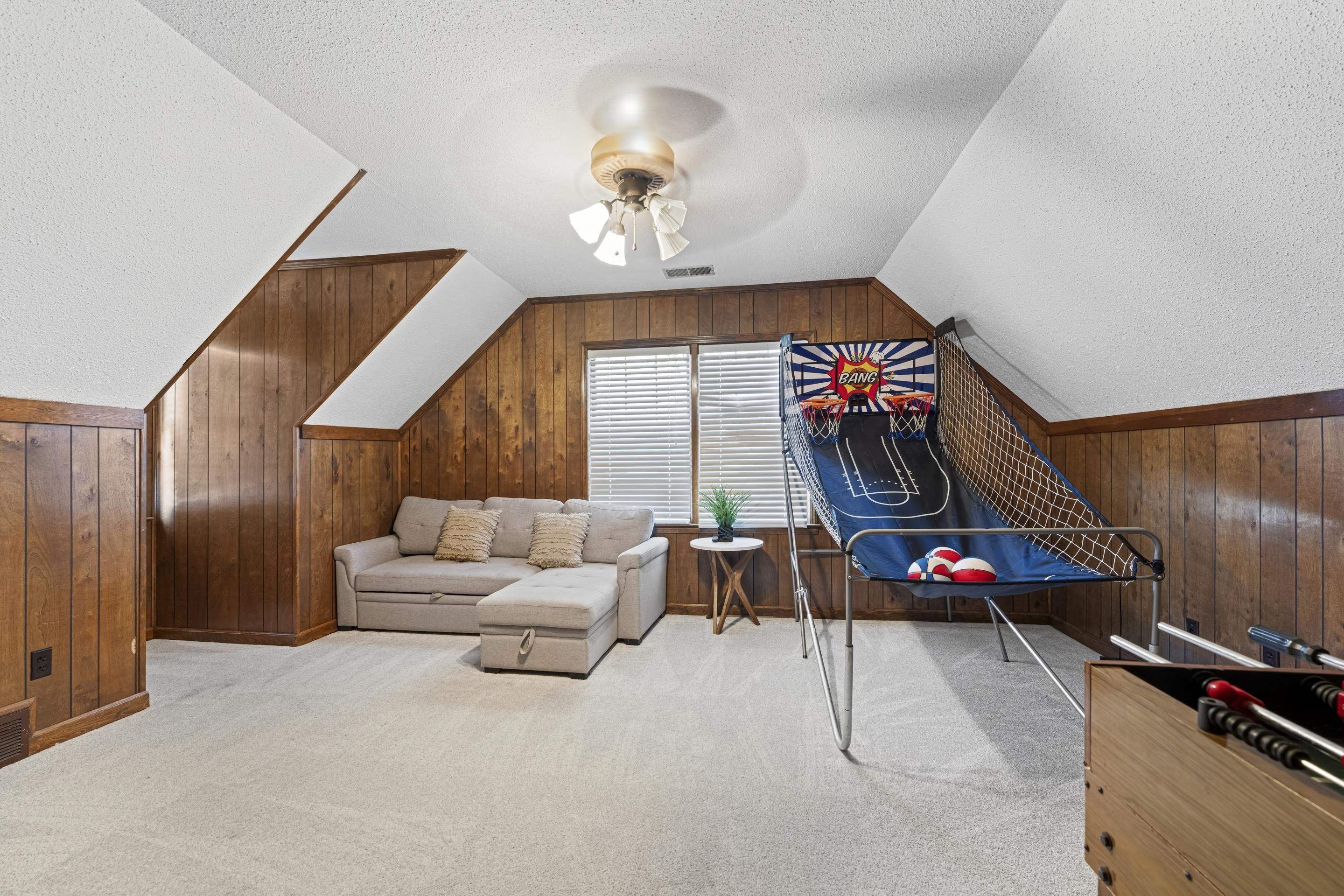 1316 Kirby Road Memphis, TN 38120 - Photo 27 of 30 a living room with furniture and a ceiling fan