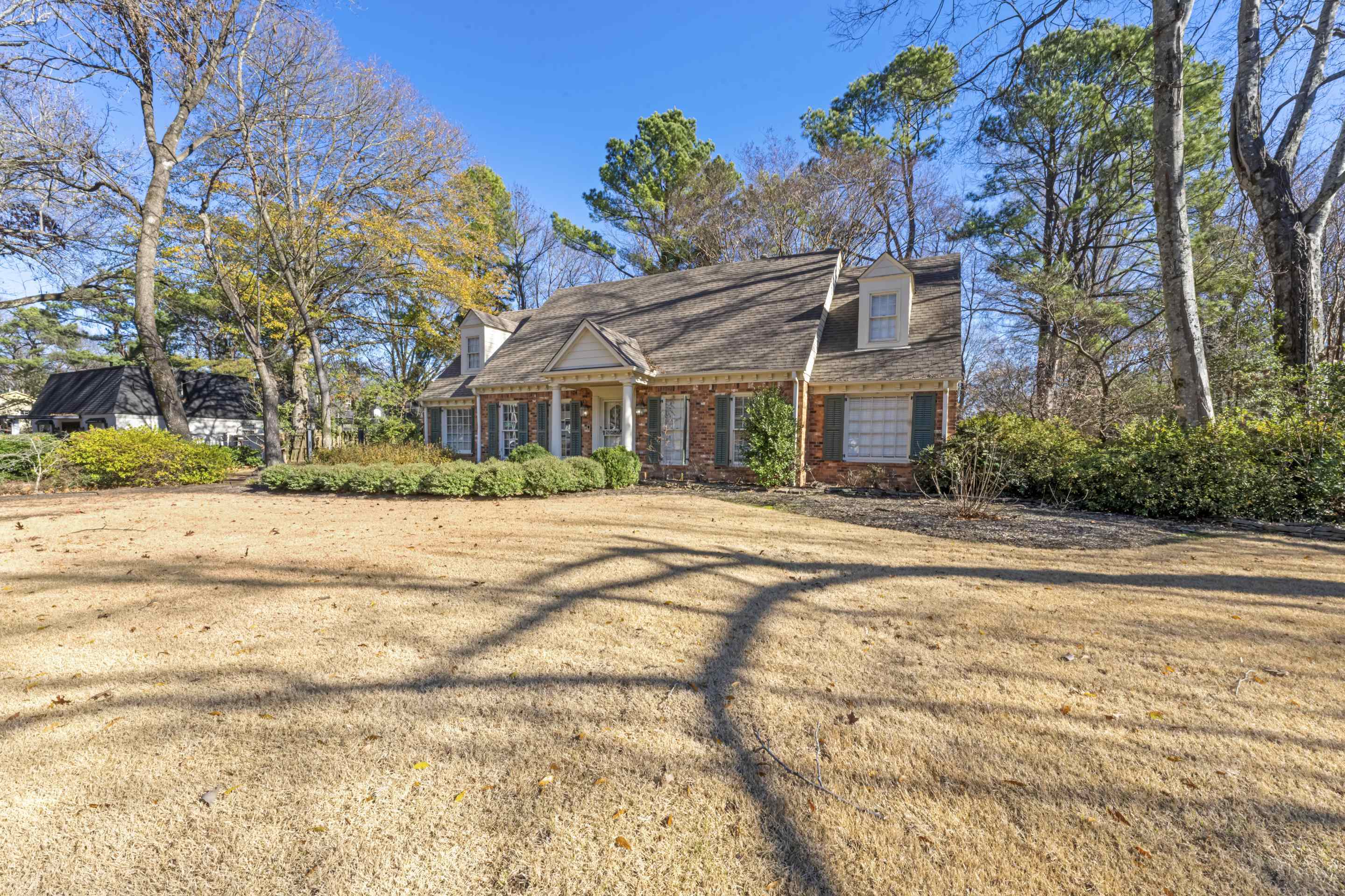 1316 Kirby Road Memphis, TN 38120 - Photo 3 of 30 a front view of a house with a yard