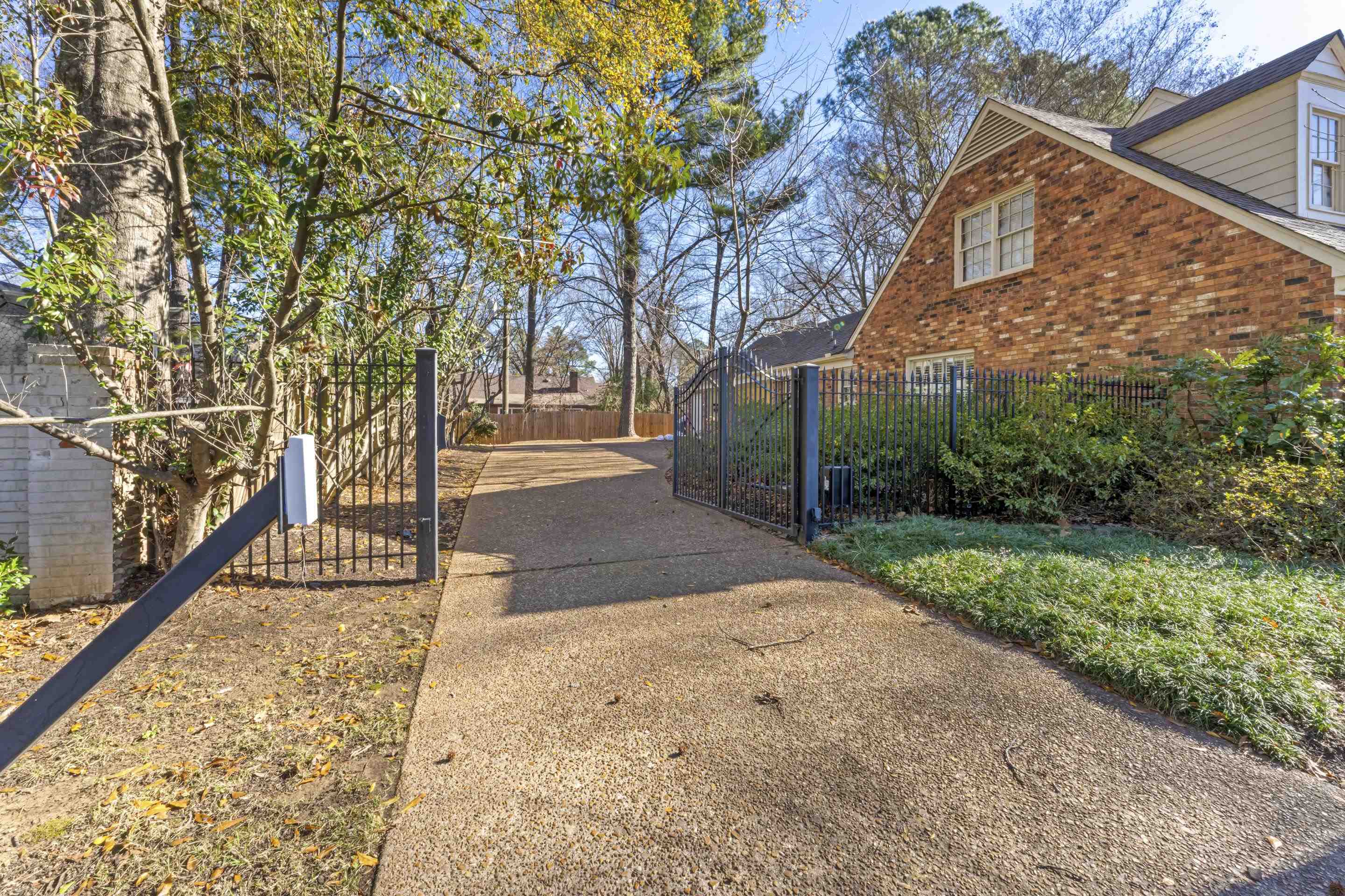 1316 Kirby Road Memphis, TN 38120 - Photo 4 of 30 a view of a pathway with a yard