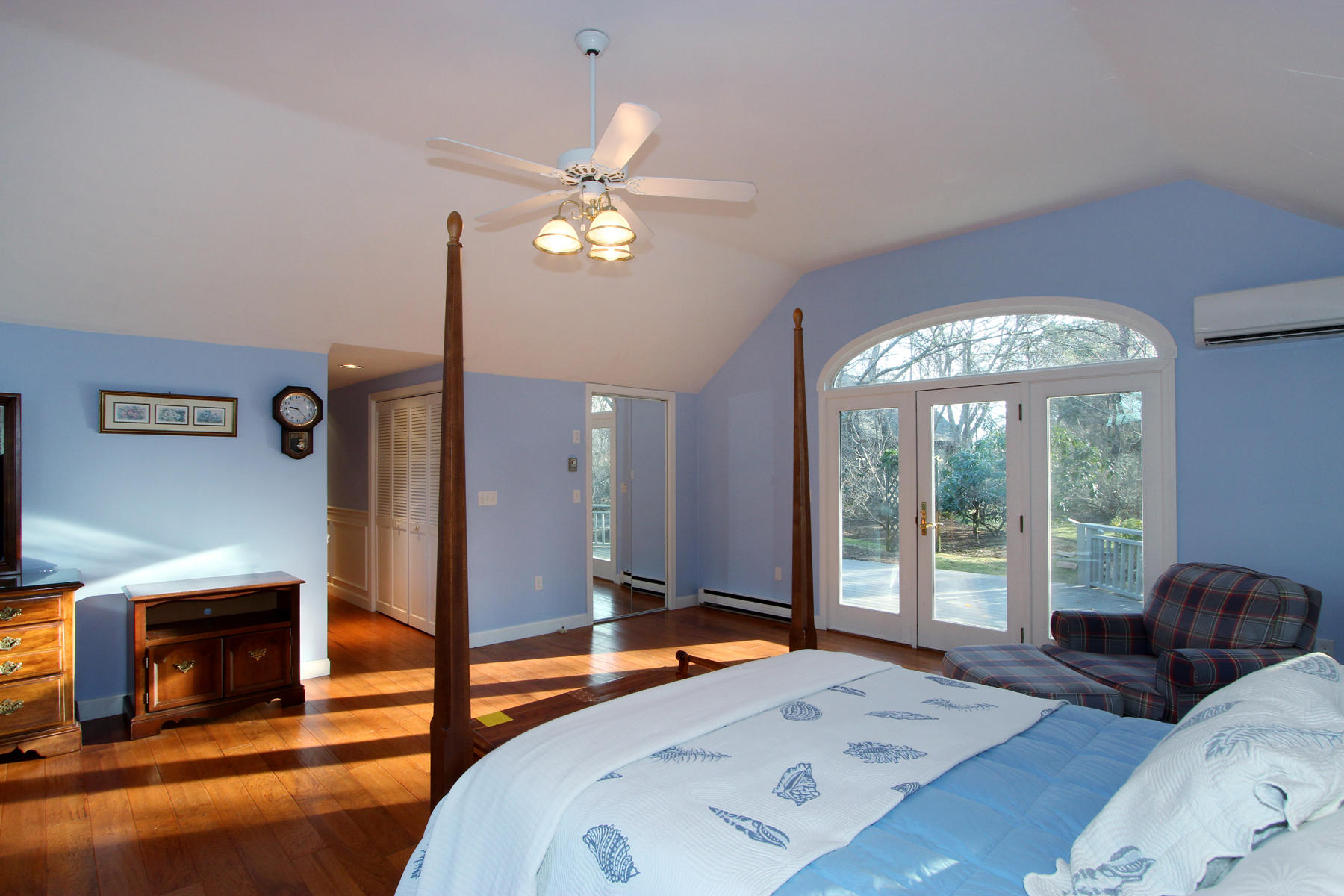 10 Highland Road Eastham, MA 02642 - Photo 13 of 31 a bedroom with a bed and a large window