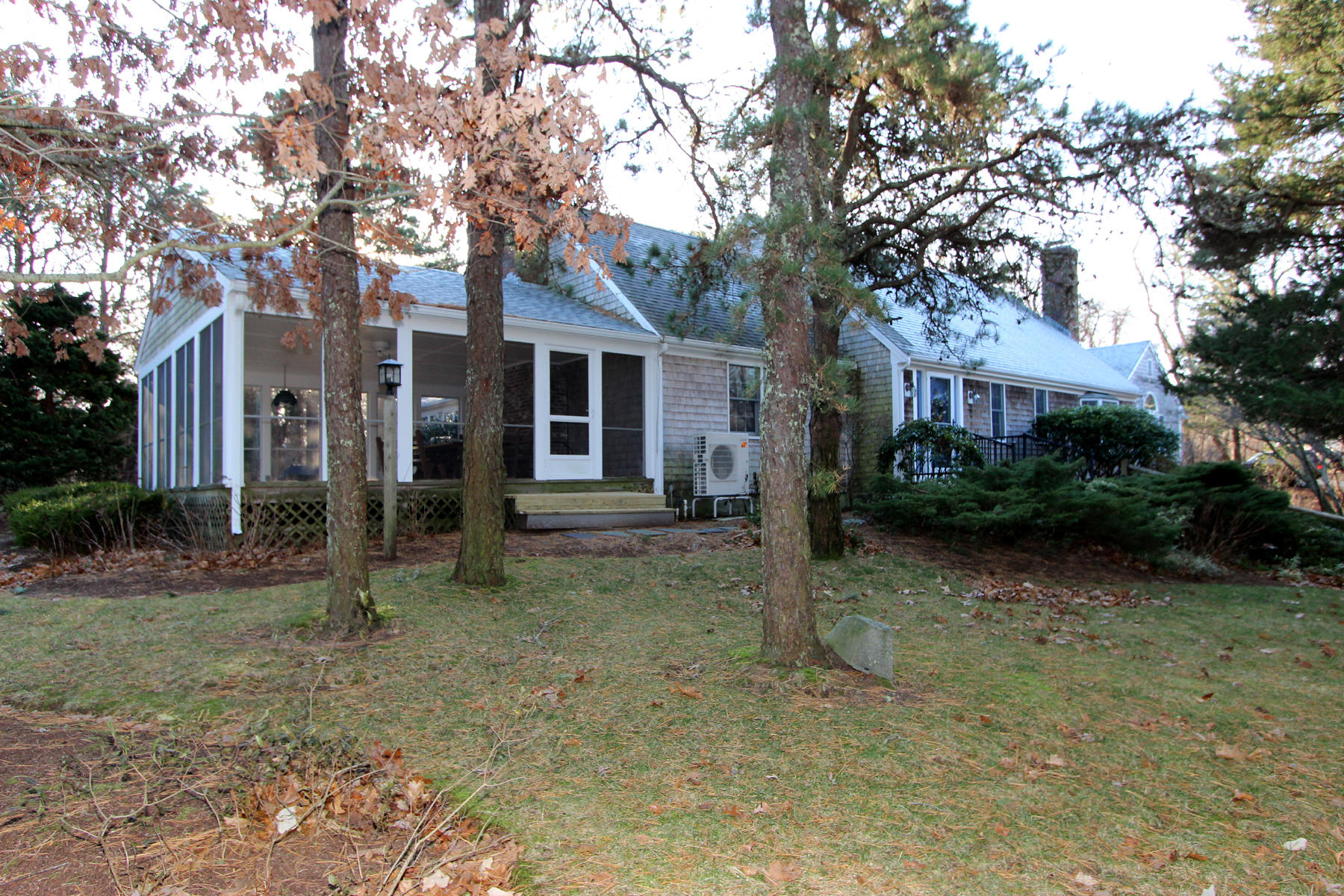 10 Highland Road Eastham, MA 02642 - Photo 2 of 31 a view of a house with a yard