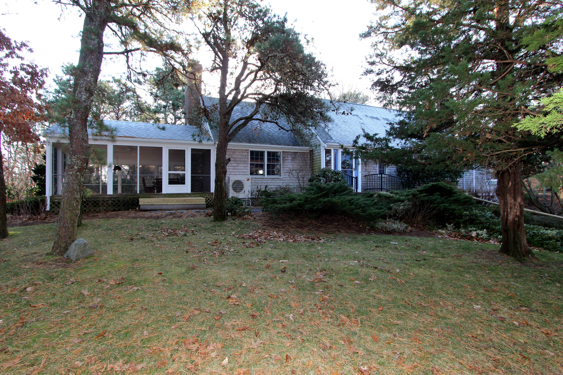 10 Highland Road Eastham, MA 02642 - Photo 24 of 31 a front view of house with yard and trees