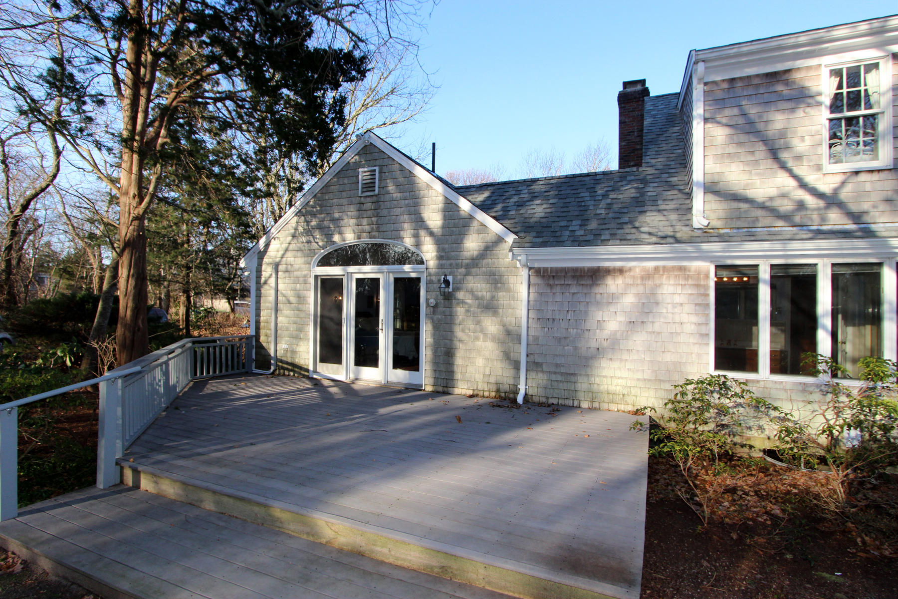 10 Highland Road Eastham, MA 02642 - Photo 25 of 31 a front view of a house with a yard