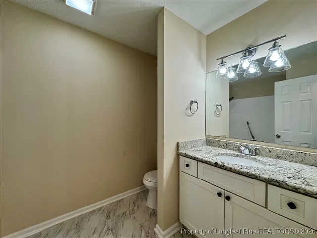 a bathroom with a shower and a bath tub