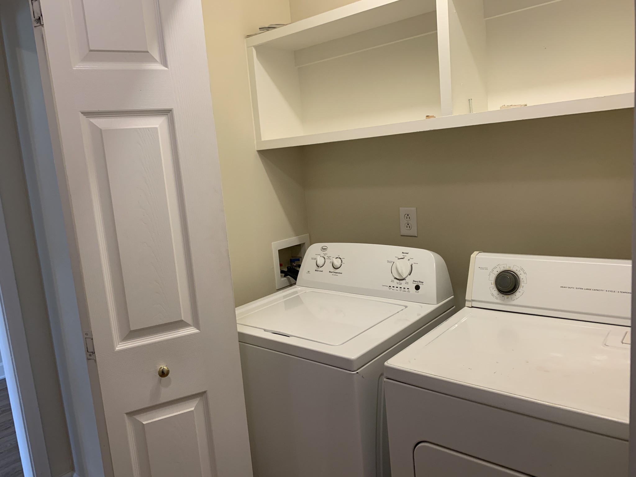1036 Persimmon Drive Spring Hill, TN 37174 - Photo 11 of 12 a utility room with dryer and washer
