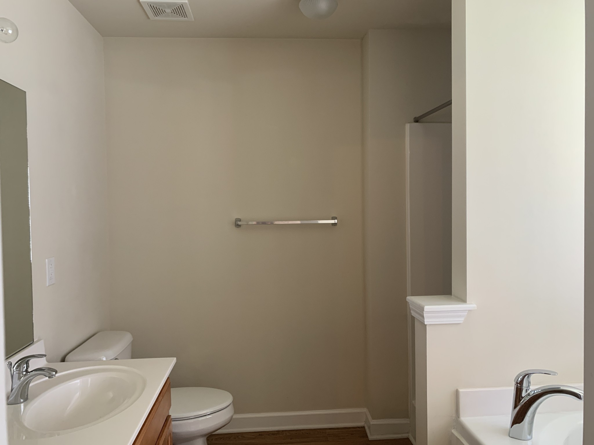 1036 Persimmon Drive Spring Hill, TN 37174 - Photo 7 of 12 a bathroom with a granite countertop toilet and sink