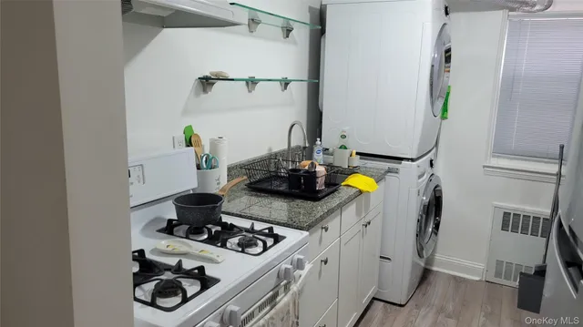 a kitchen with a stove and a refrigerator