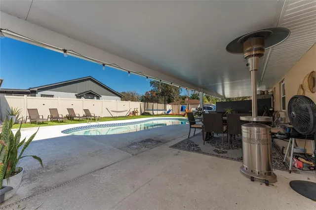 a room with gym equipment and a large window