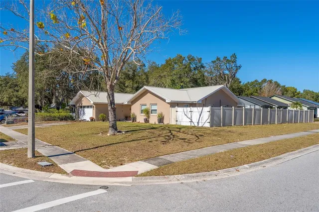 a view of a house with a street