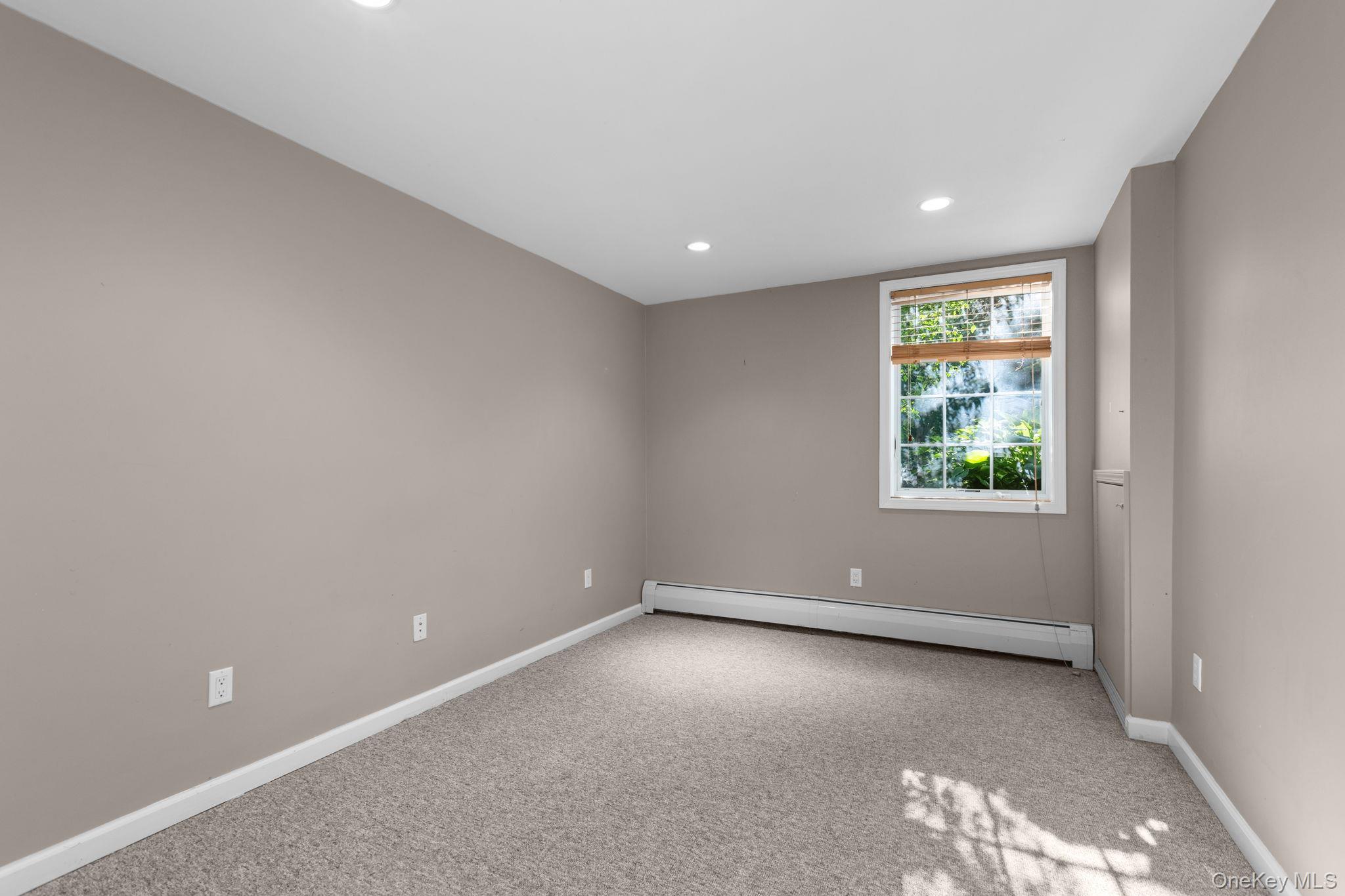 2211 Crompond Road Yorktown Heights, NY 10598 - Photo 27 of 38 an empty room with windows