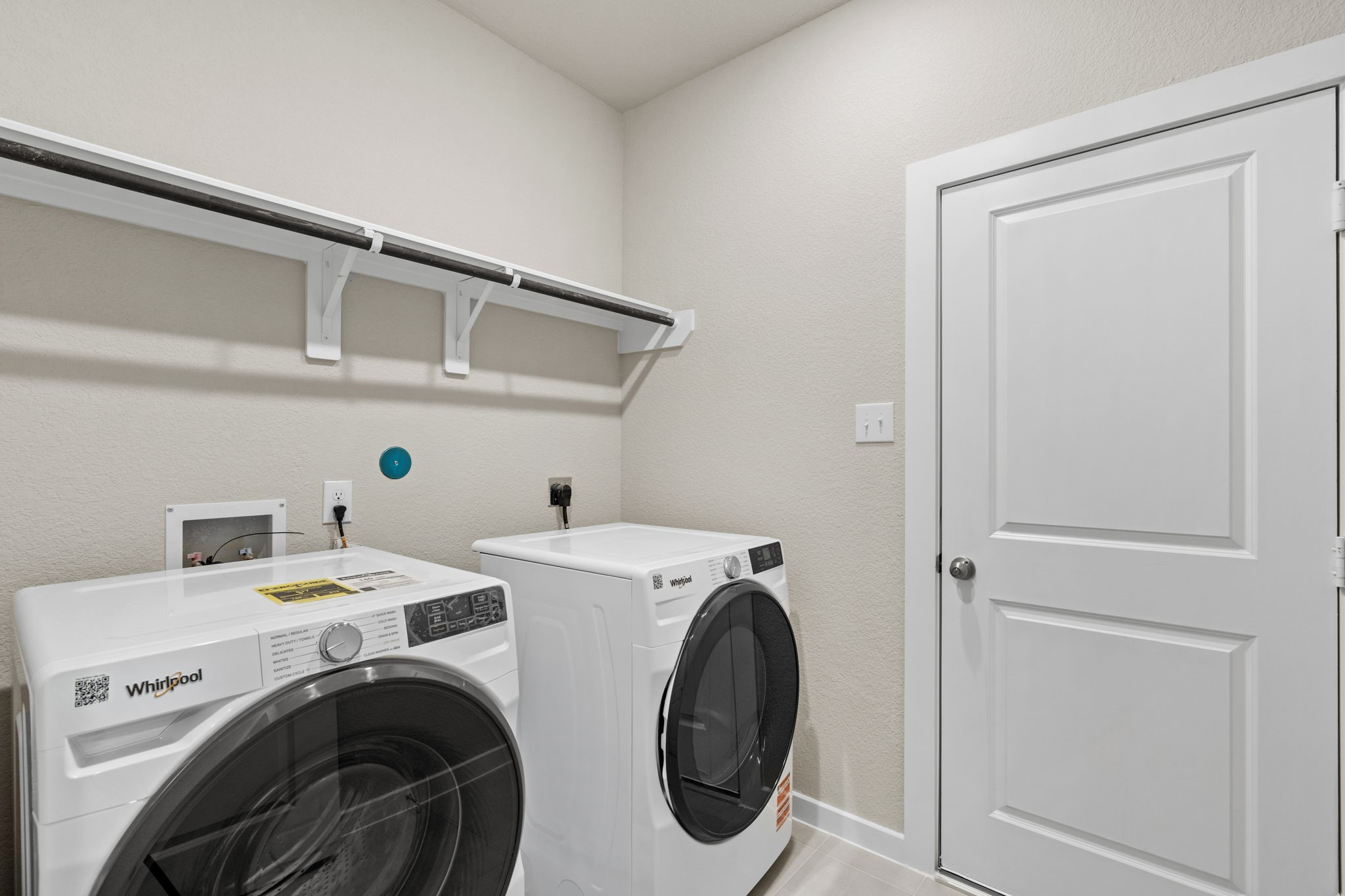 12343 Ridge Top Drive Conroe, TX 77304 - Photo 24 of 32 a utility room with dryer and washer