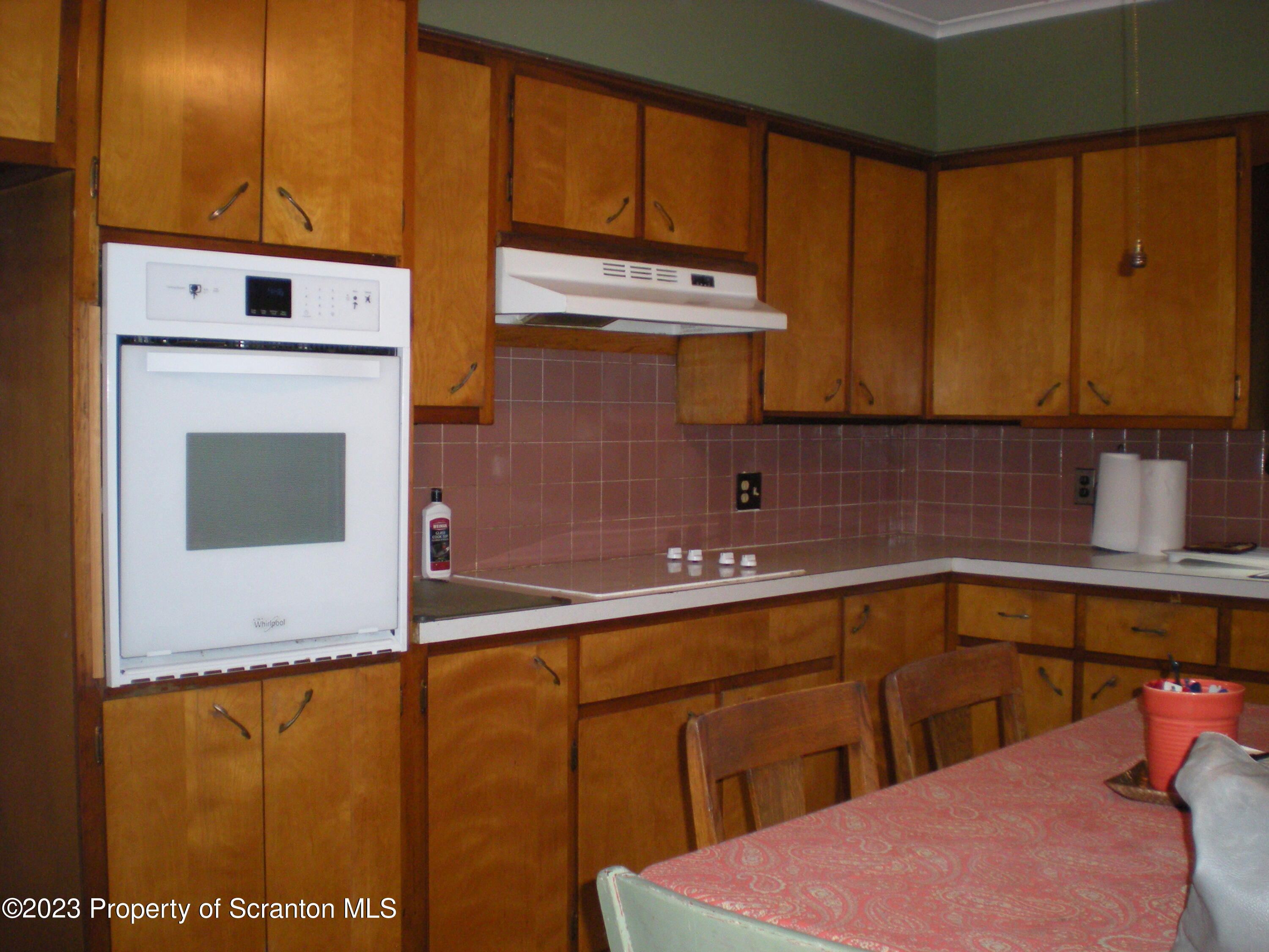 217 Ferdinand Street Scranton, PA 18508 - Photo 11 of 39 a kitchen with stainless steel appliances a sink a stove and a refrigerator