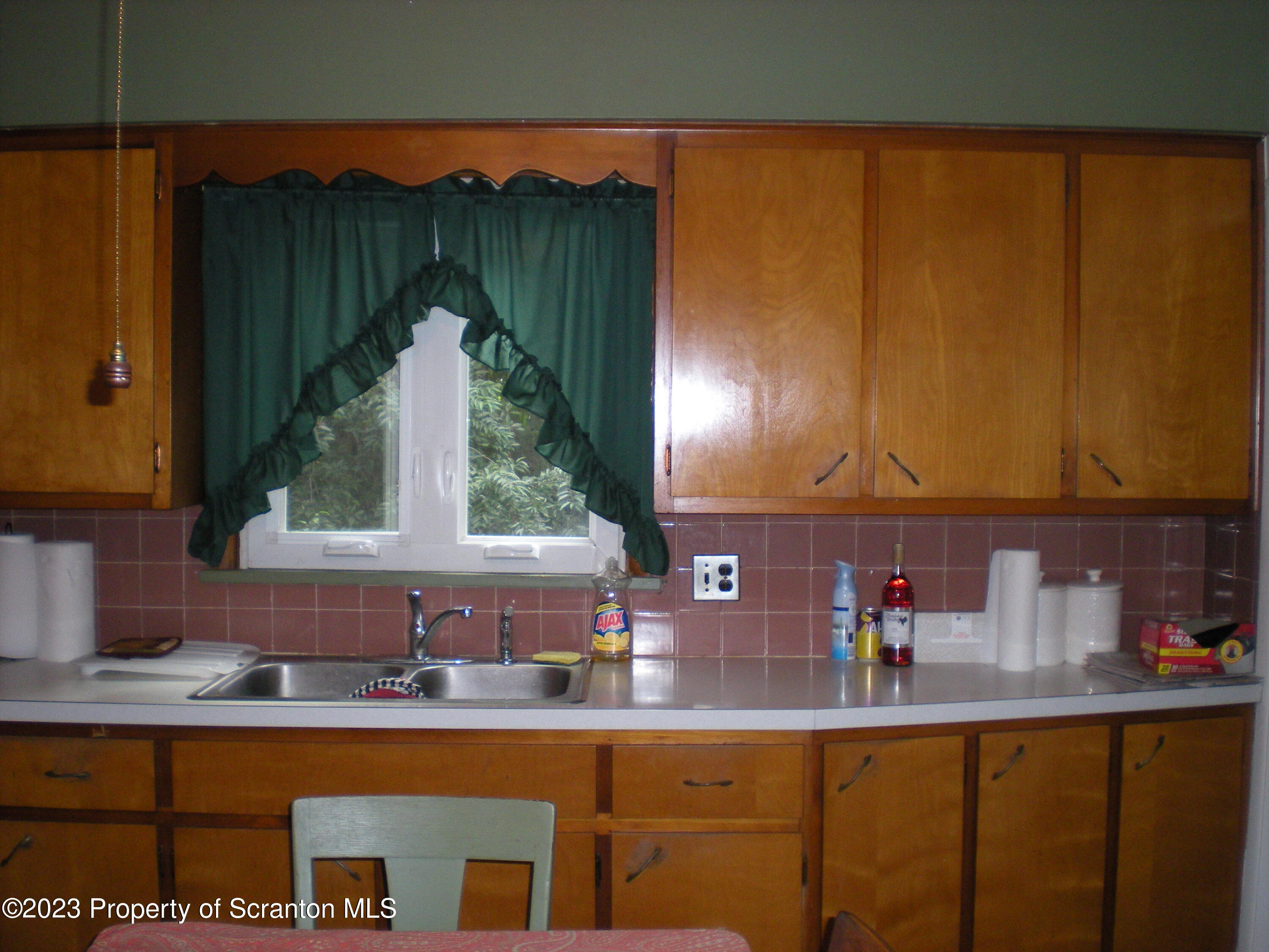 217 Ferdinand Street Scranton, PA 18508 - Photo 12 of 39 a kitchen with sink and cabinets