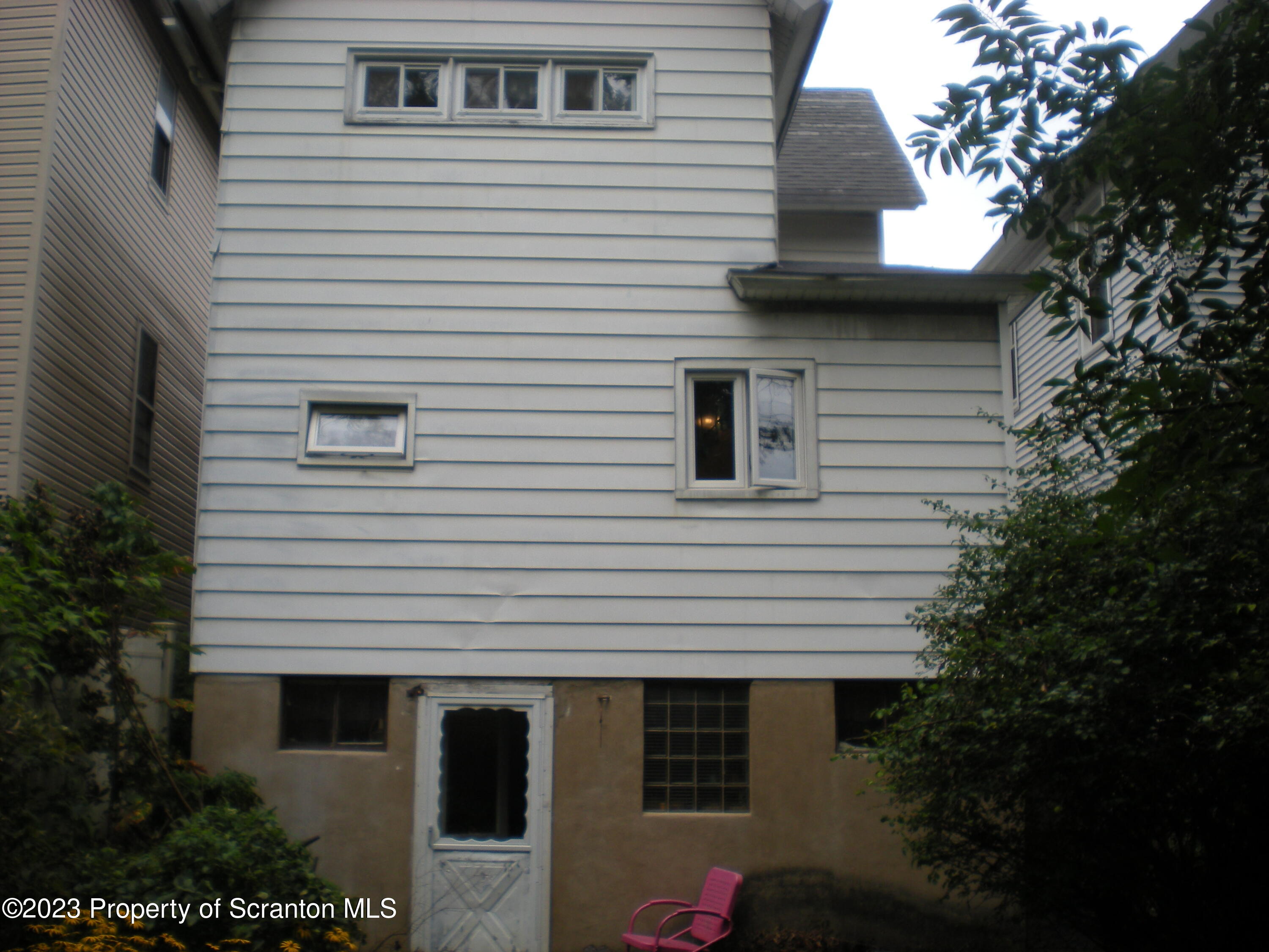 217 Ferdinand Street Scranton, PA 18508 - Photo 2 of 39 a view of a house with a yard and garage