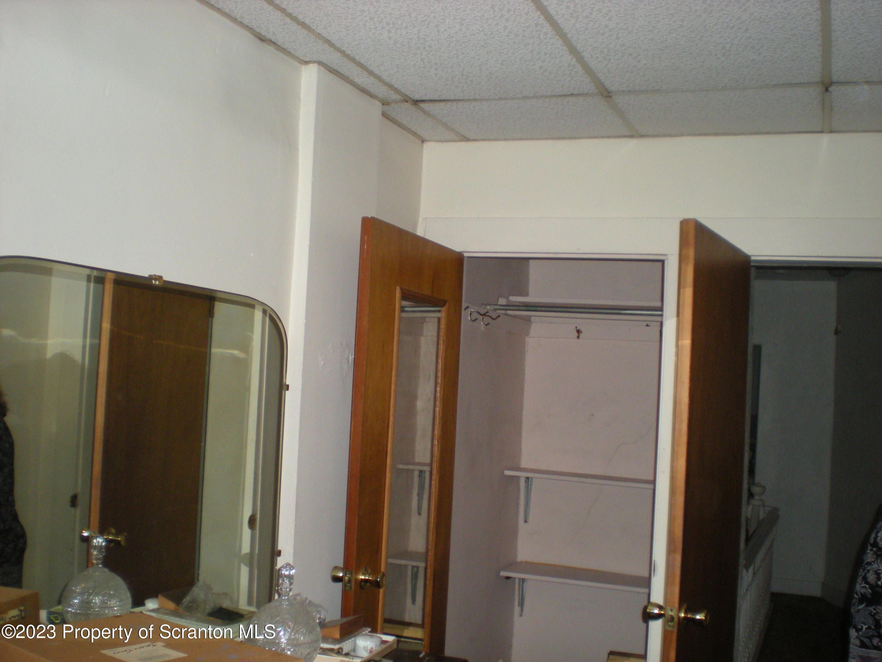 217 Ferdinand Street Scranton, PA 18508 - Photo 23 of 39 a bathroom with a shower and a glass door
