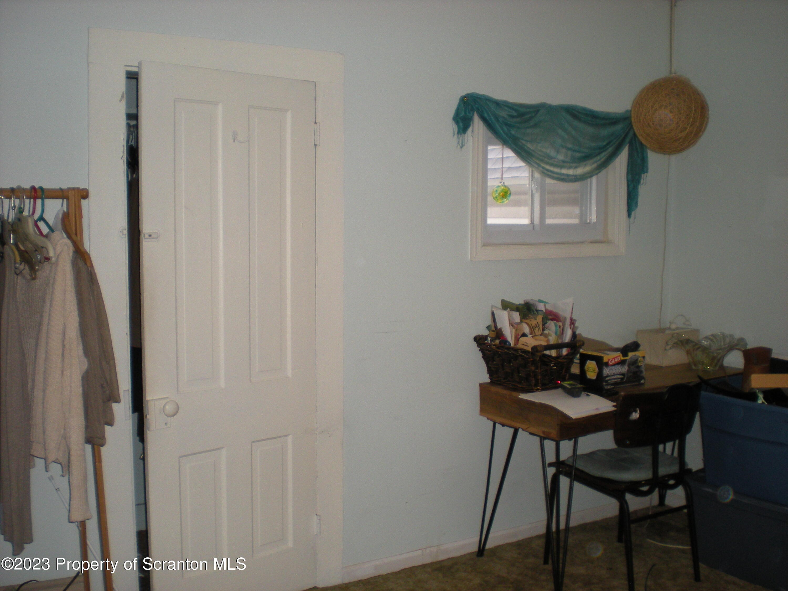 217 Ferdinand Street Scranton, PA 18508 - Photo 26 of 39 a dining room with furniture and a window