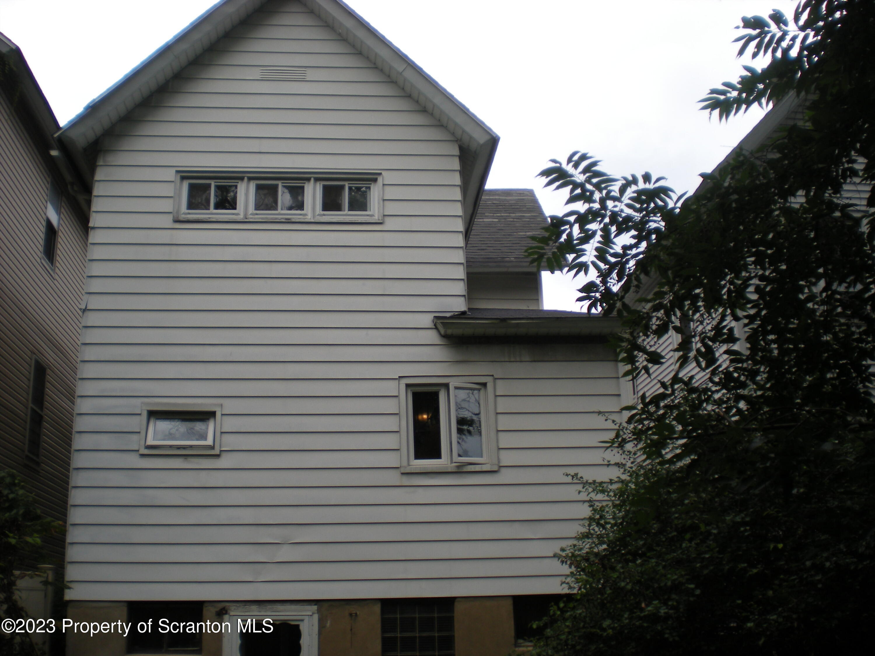 217 Ferdinand Street Scranton, PA 18508 - Photo 3 of 39 a view of a house and a yard