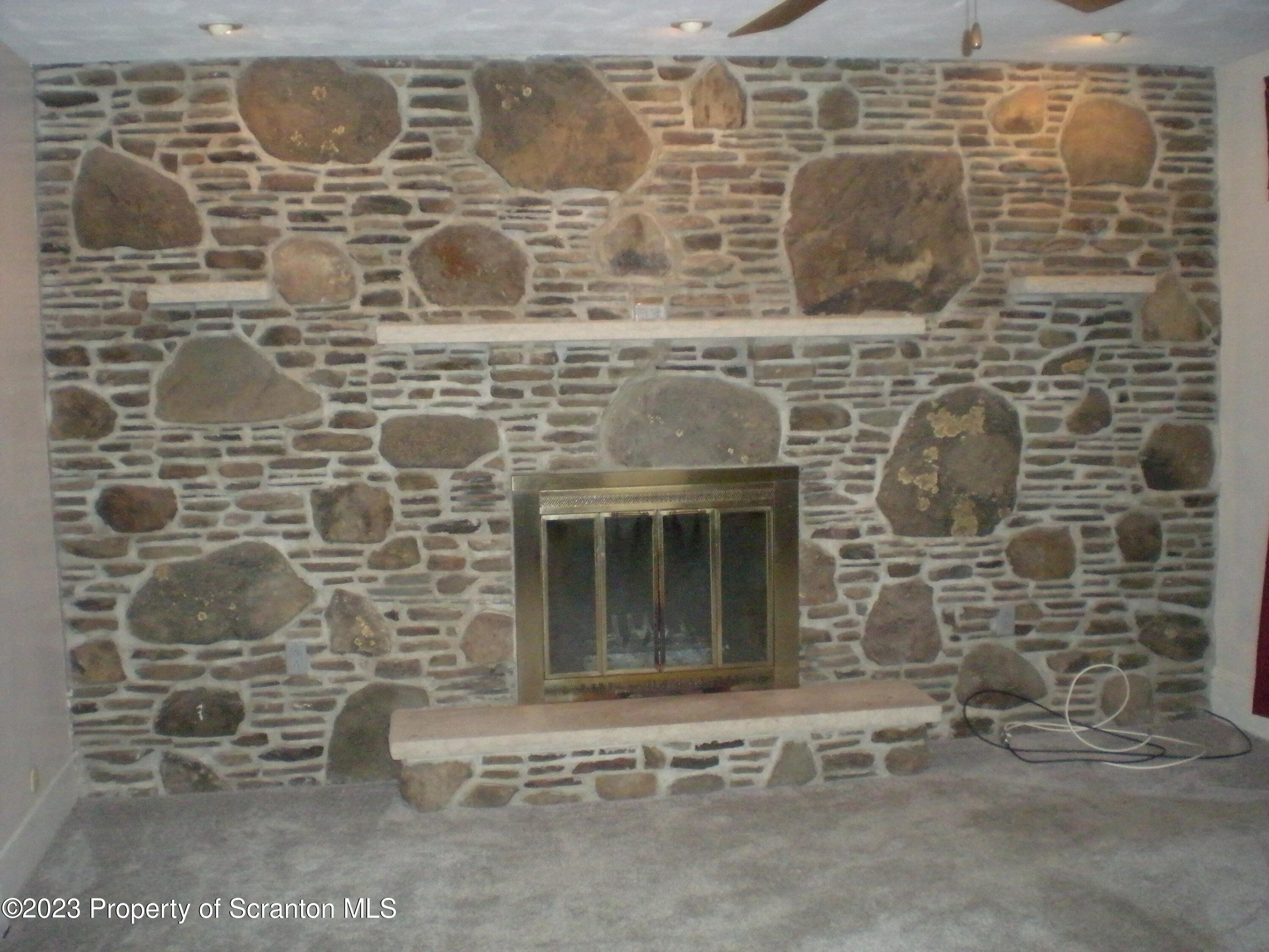 217 Ferdinand Street Scranton, PA 18508 - Photo 4 of 39 a brick building with a door