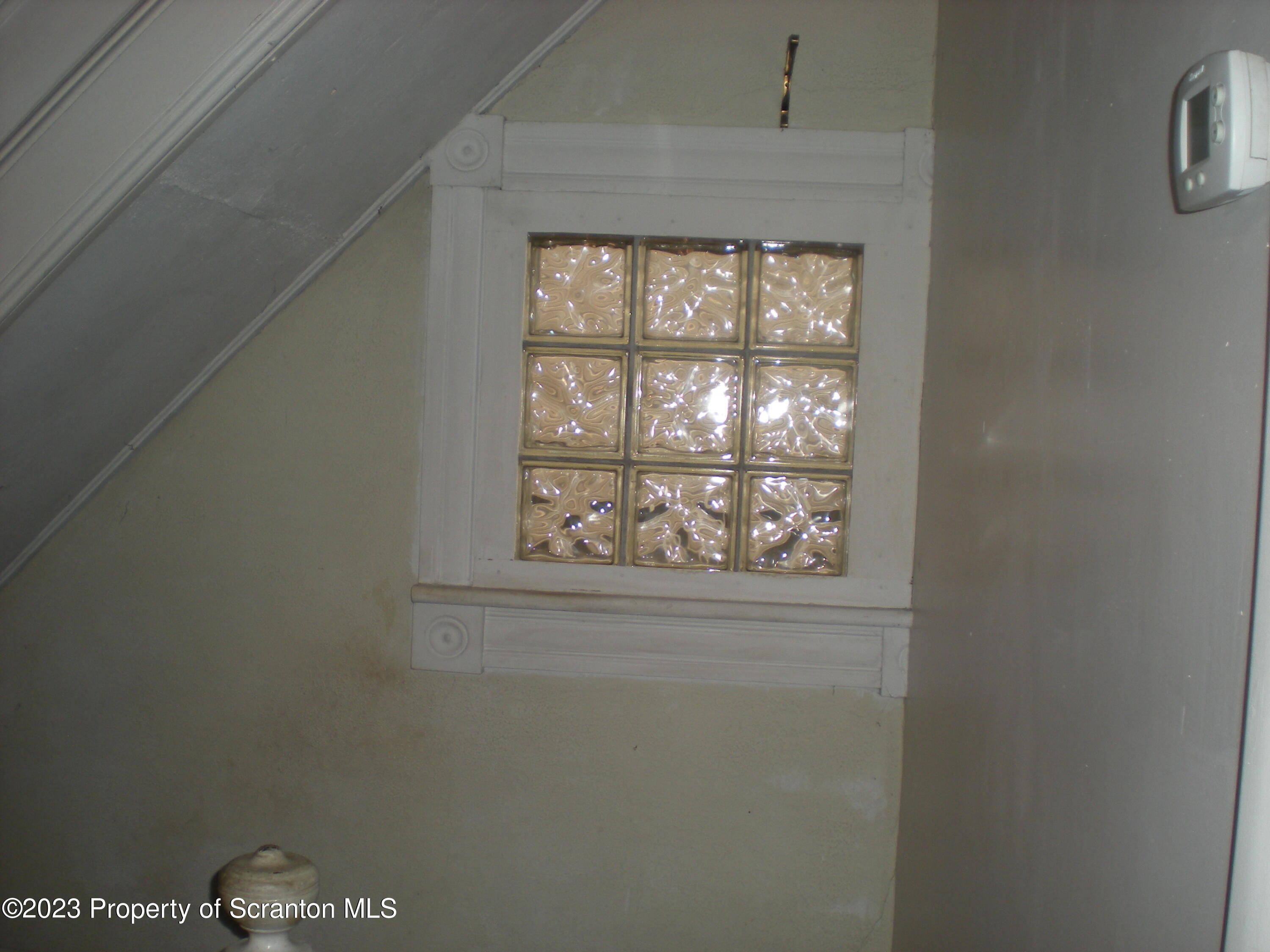 217 Ferdinand Street Scranton, PA 18508 - Photo 8 of 39 a close up of a wall with a window