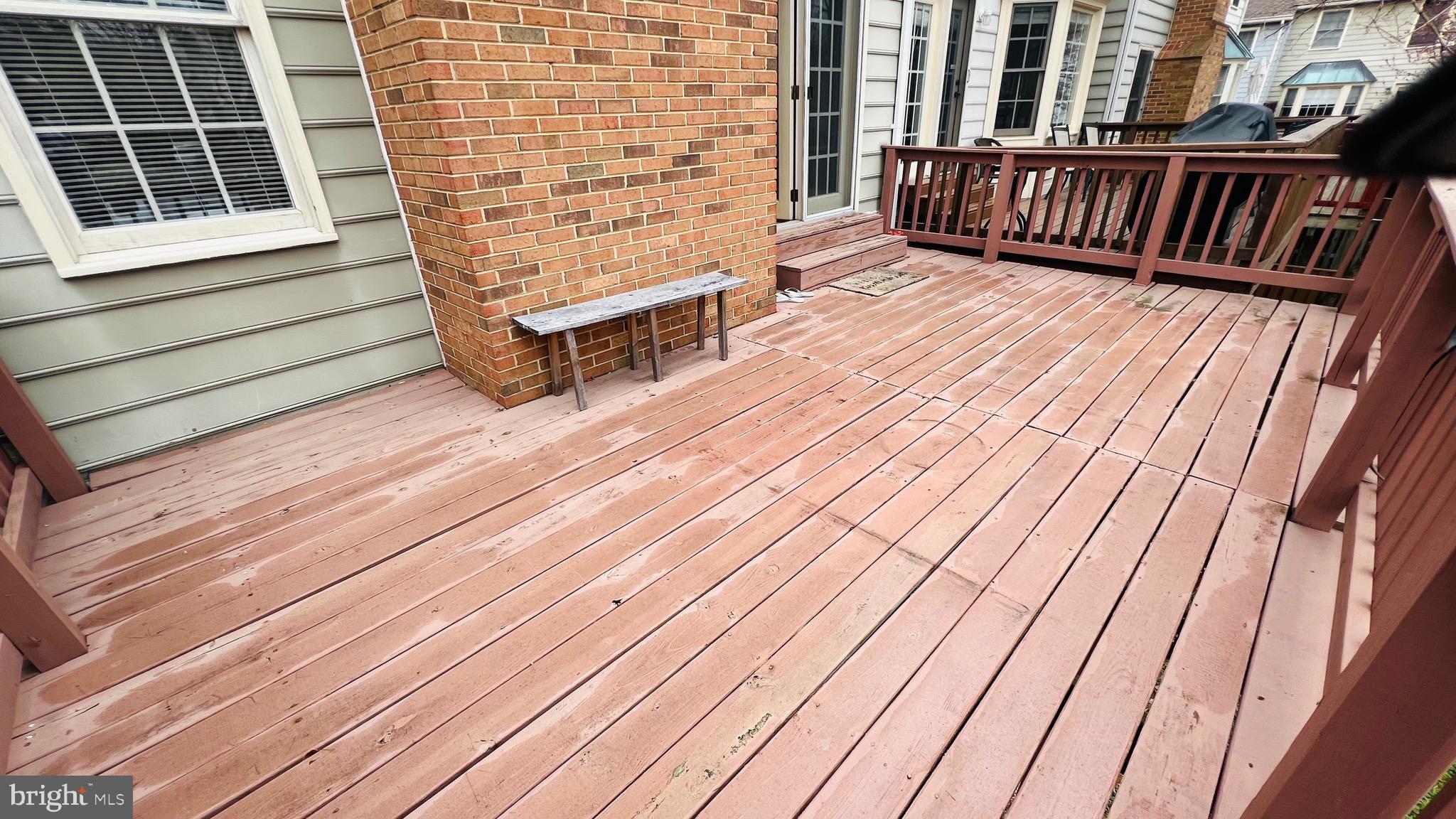 8035 Trevor Place Vienna, VA 22182 - Photo 36 of 48 a view of wooden roof deck
