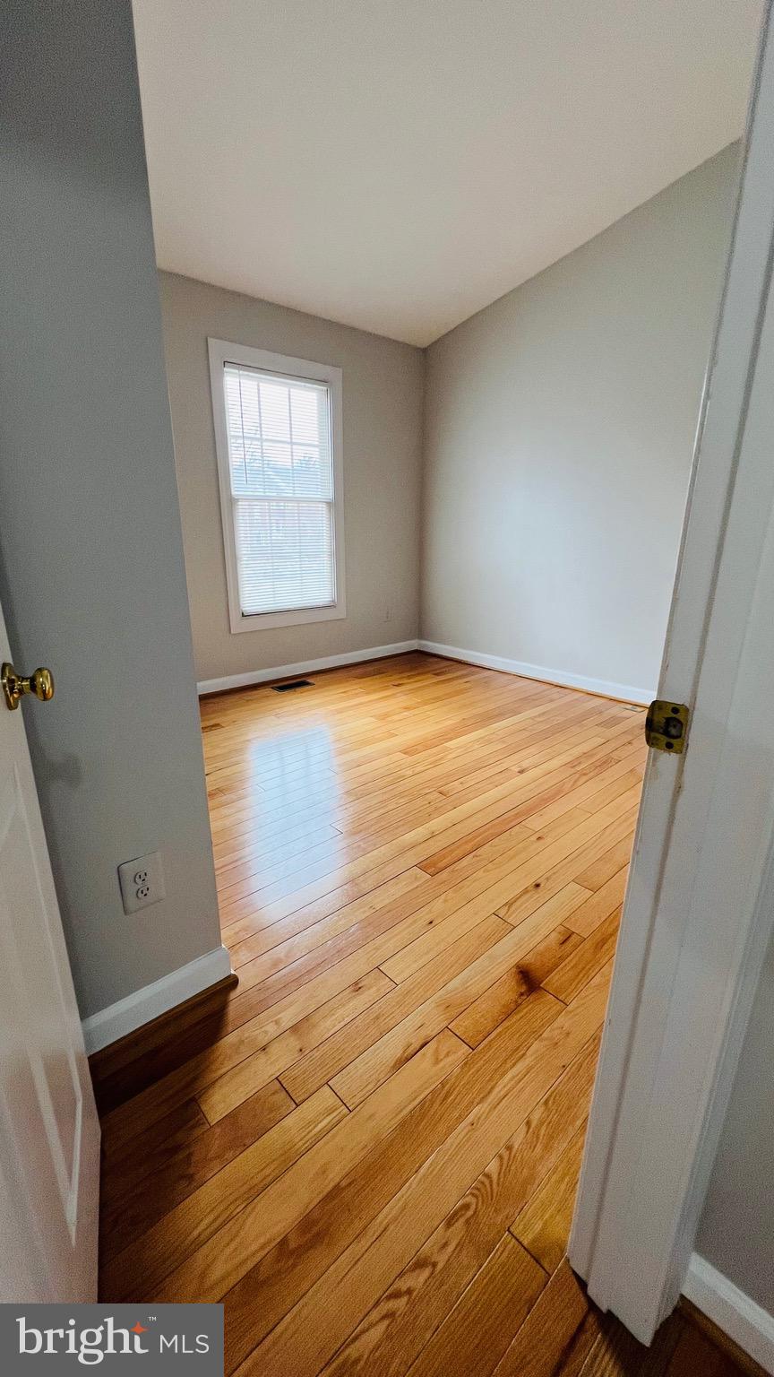 8035 Trevor Place Vienna, VA 22182 - Photo 40 of 48 a view of empty room with window