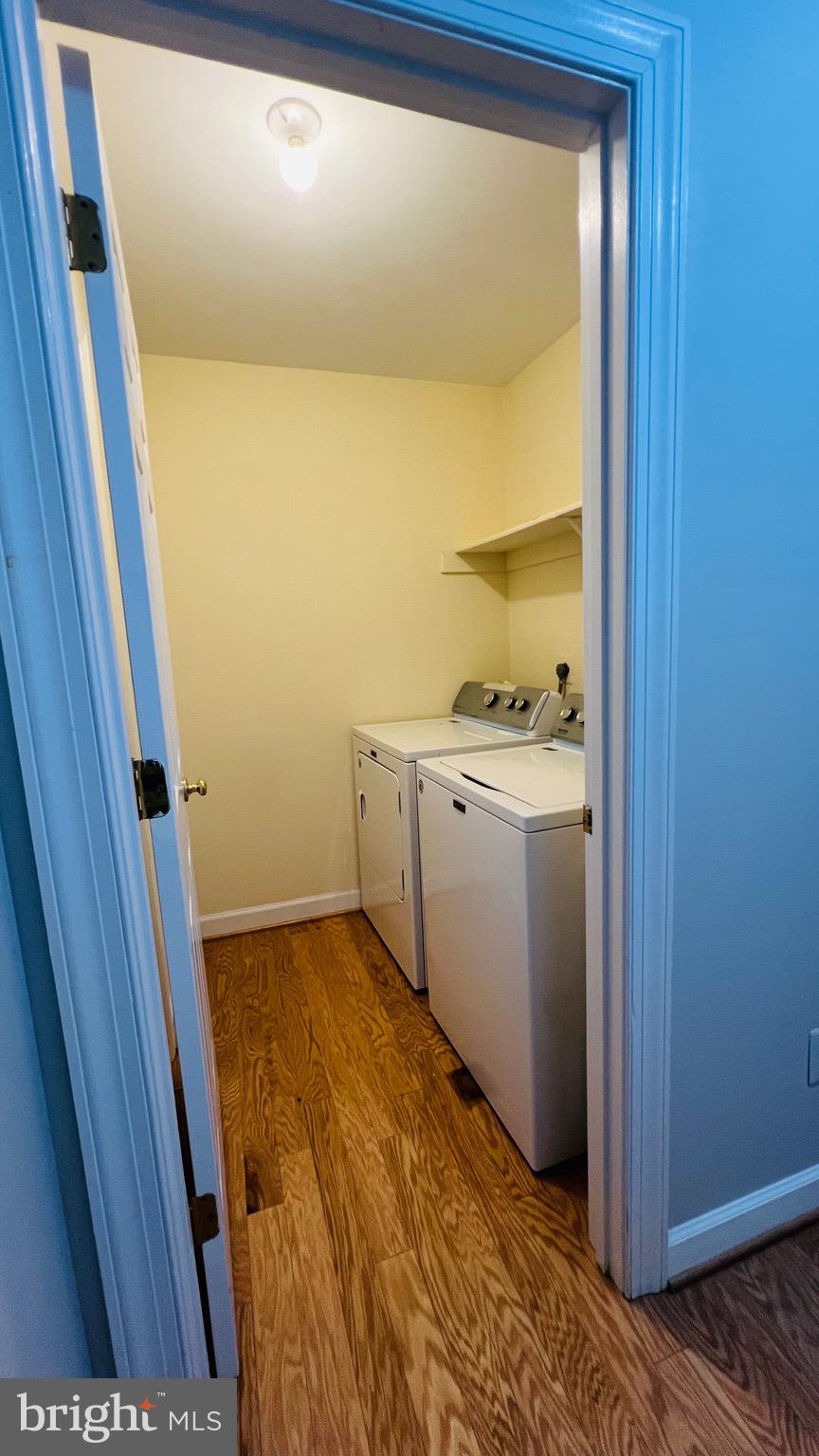 8035 Trevor Place Vienna, VA 22182 - Photo 9 of 48 a bathroom with a sink and a mirror