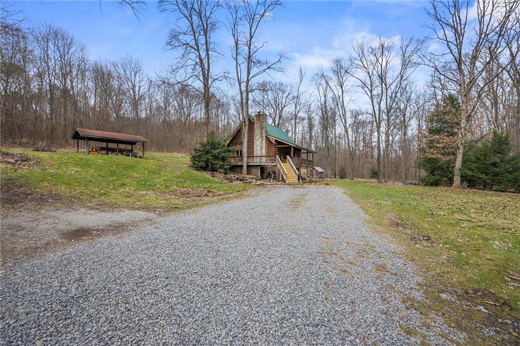 515 Hooker Road West Sunbury, PA 16061 - Photo 5 of 47 Long Drive to the home!