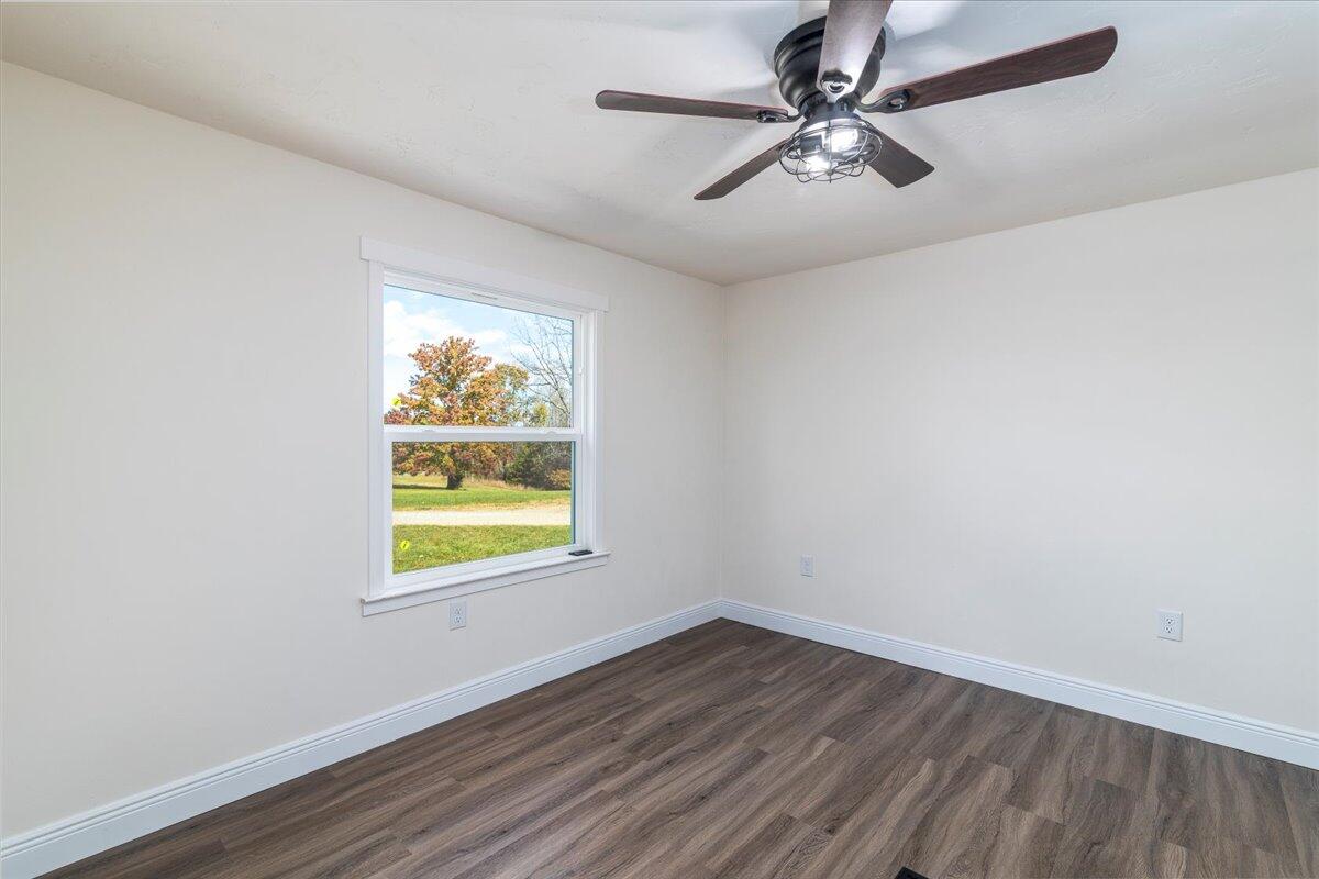36 Nutmeg Lane Penhook, VA 24137 - Photo 17 of 37 wooden floor in an empty room with a window