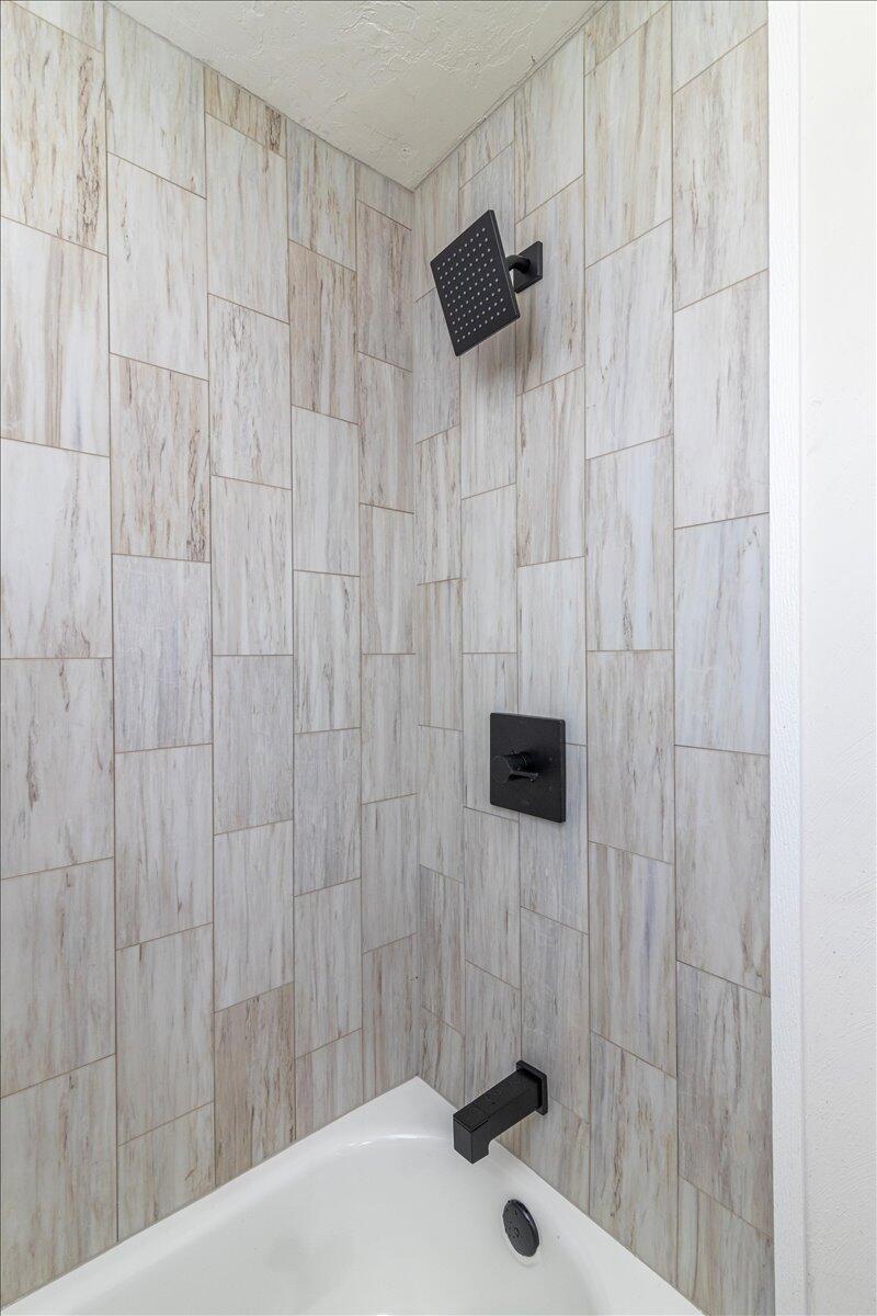 36 Nutmeg Lane Penhook, VA 24137 - Photo 20 of 37 a bathroom with a shower and a sink